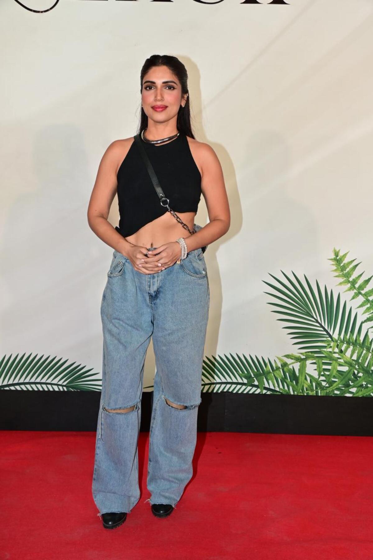 Bhumi Pednekar was also spotted at the new eatery. She was wearing an asymmetrical black top with knee-cut blue denim and a black sling bag.