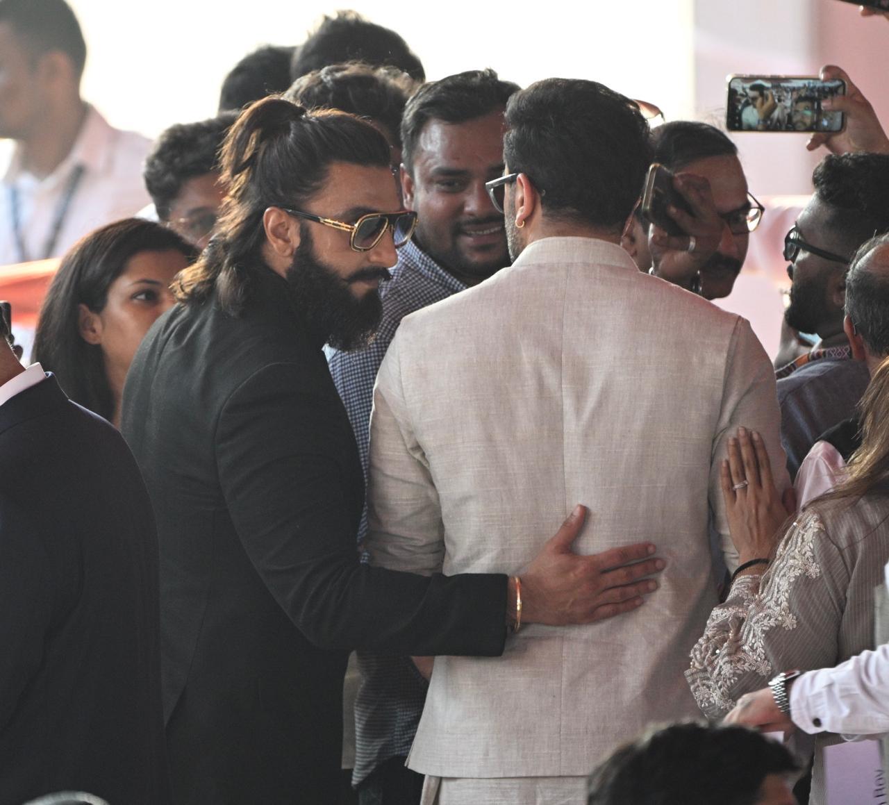 Ranveer Singh opted for an all-black look in Indo-Western formals with his half-tied hair.