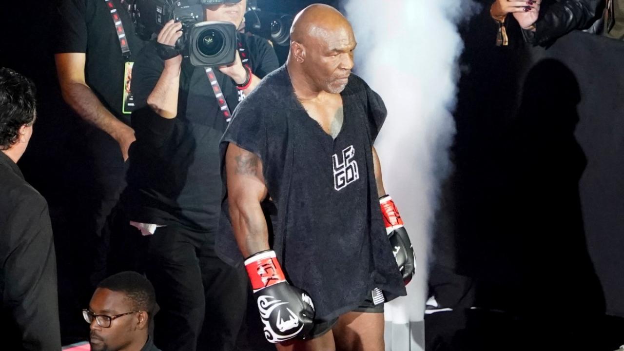 Mike Tyson, the legendary boxing icon, returned to the ring after a 19-year hiatus, facing YouTuber Jake Paul in a high-profile showdown at AT&T Stadium, Arlington, Texas, on November 16. Tyson, aged 58, hadn't fought since his retirement in 2005 after a loss to Kevin McBride. His return, filled with dramatic pre-fight confrontations—including a slap from Tyson that left Paul shaken—made headlines, propelling him to one of the most searched athletes of the year.
