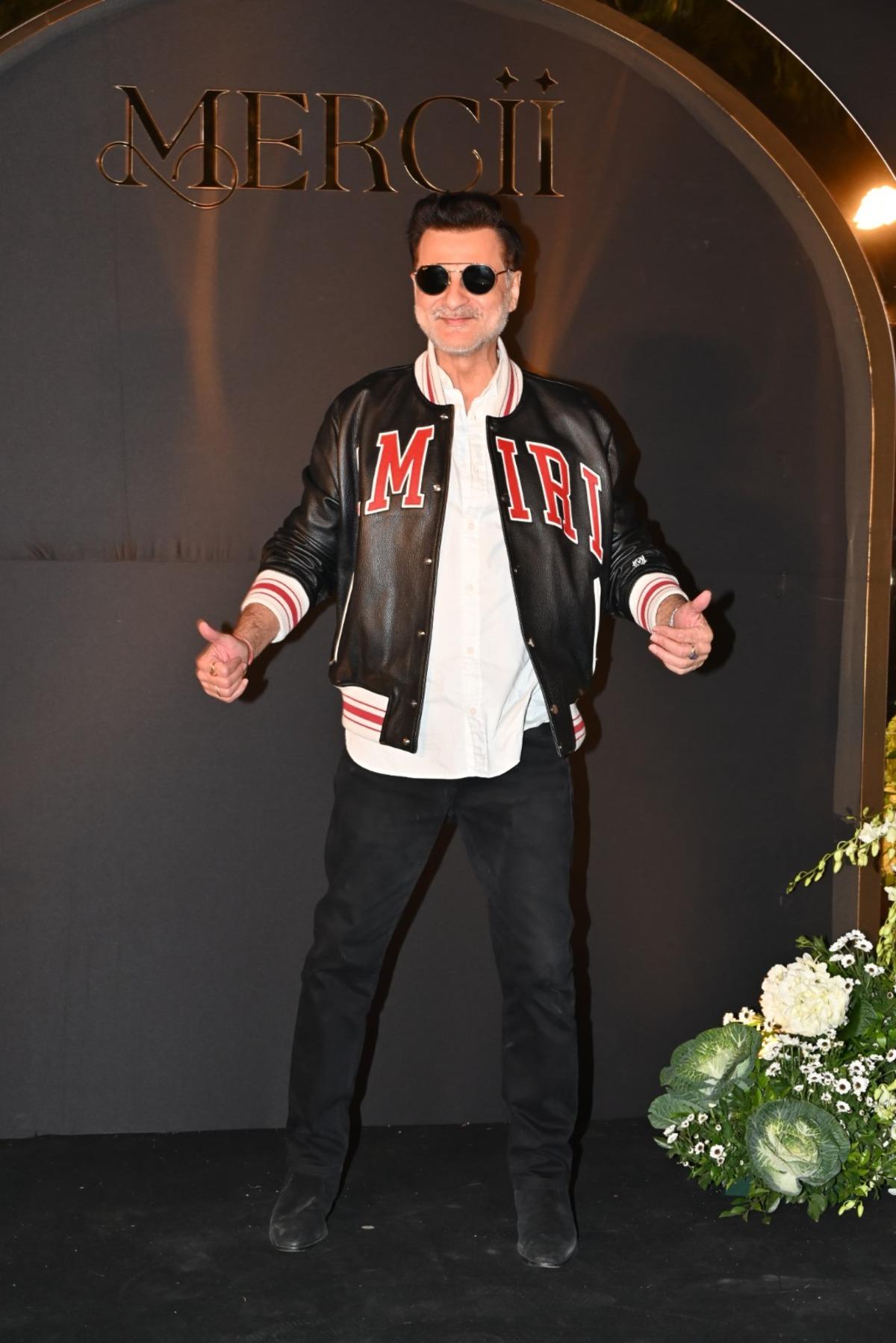 Sanjay Kapoor looked cool in his black varsity leather jacket which he paired with a white shirt and black jeans. He also accessorised the fit with black shades.