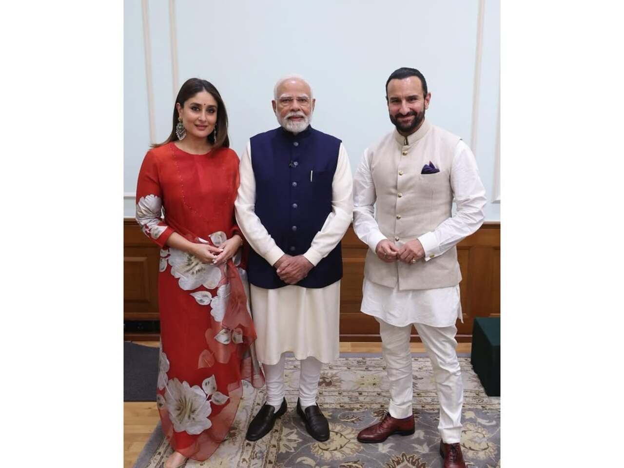 Kareena Kapoor and Saif Ali Khan pose with the Prime Minister