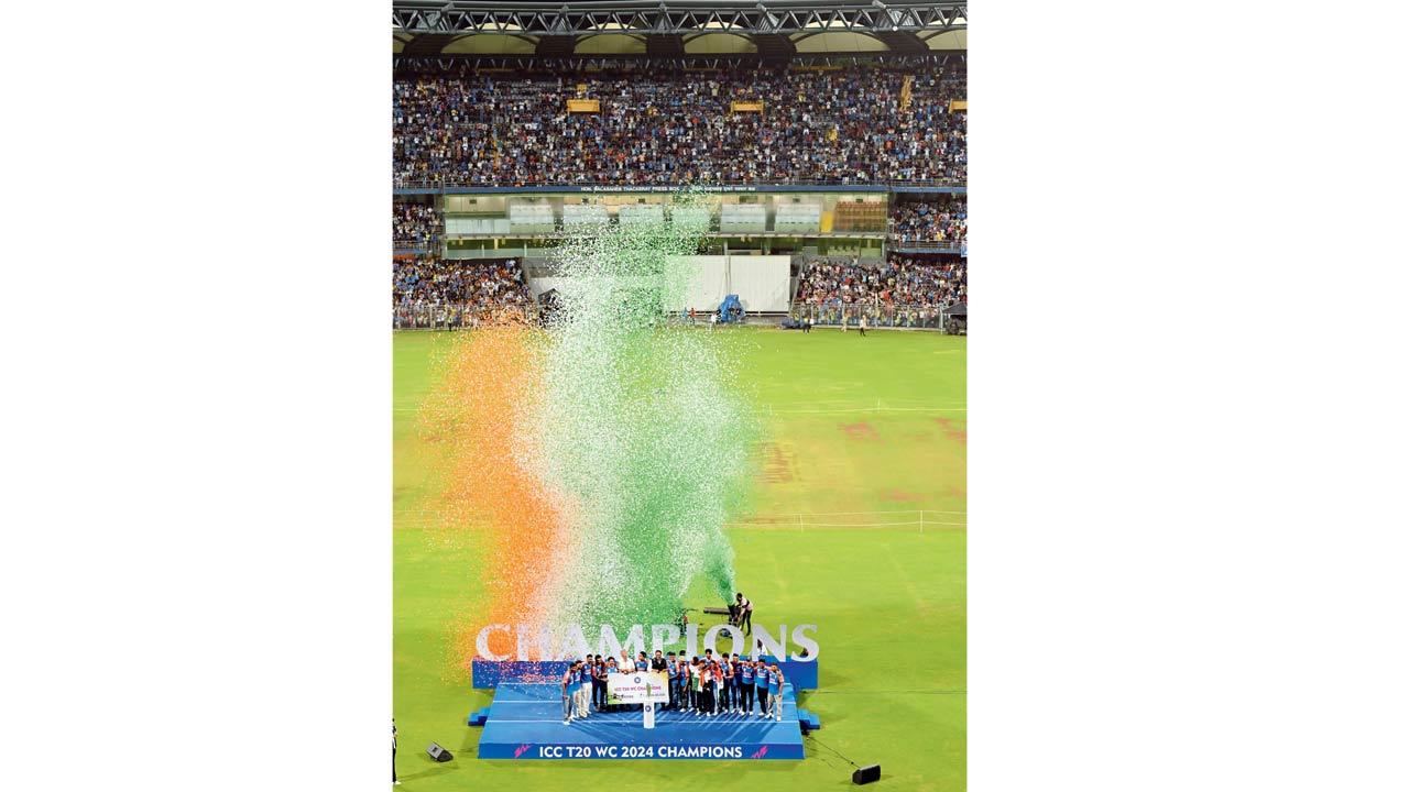 The Indian cricket team pose with the T20 World Cup trophy during a ceremony at the Wankhede stadium. Pic/Atul Kamble