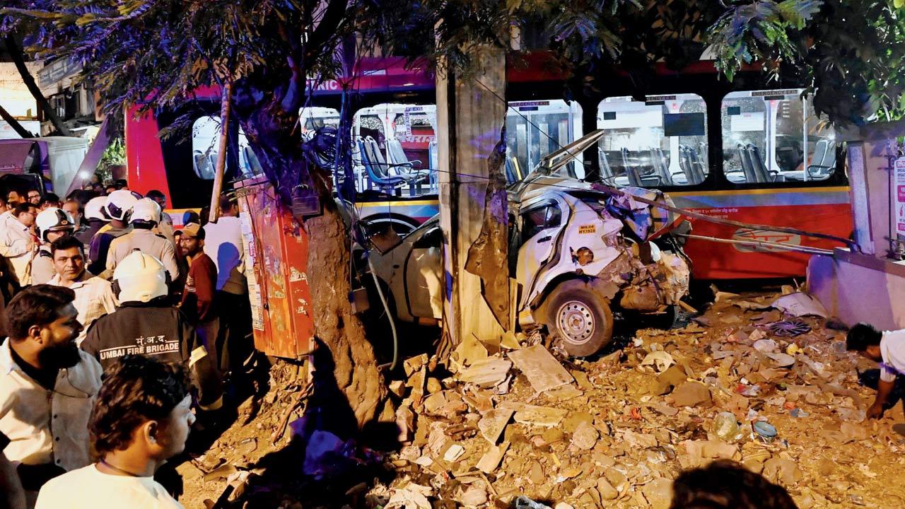 A totalled car after a BEST bus driver lost control on a busy Kurla road, ran over people and crushed vehicles before crashing into a compound wall. Pic/Sayyed Sameer Abedi