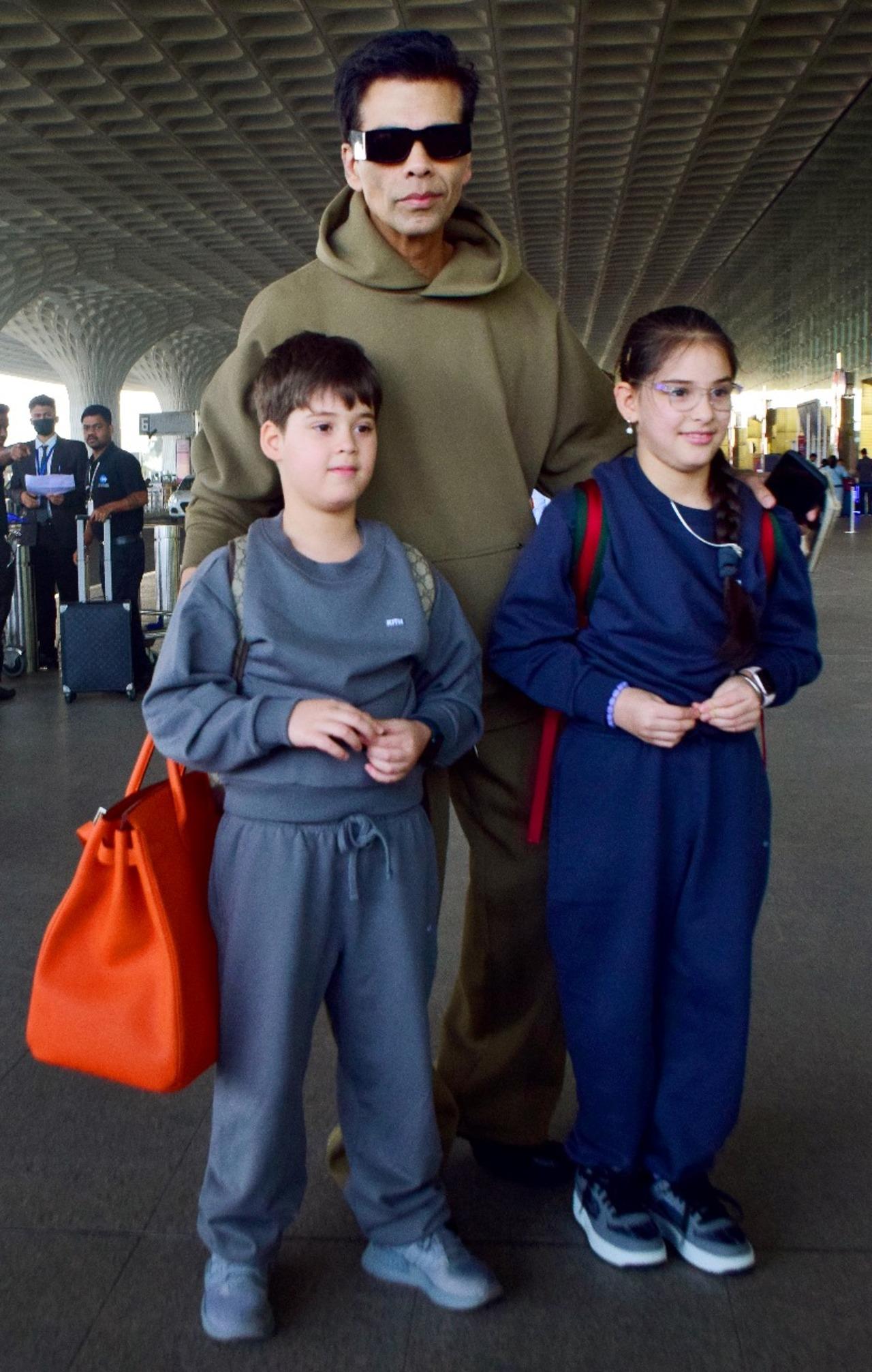 Karan Johar jetted off with his kids Yash and Roohi to celebrate New Year. 