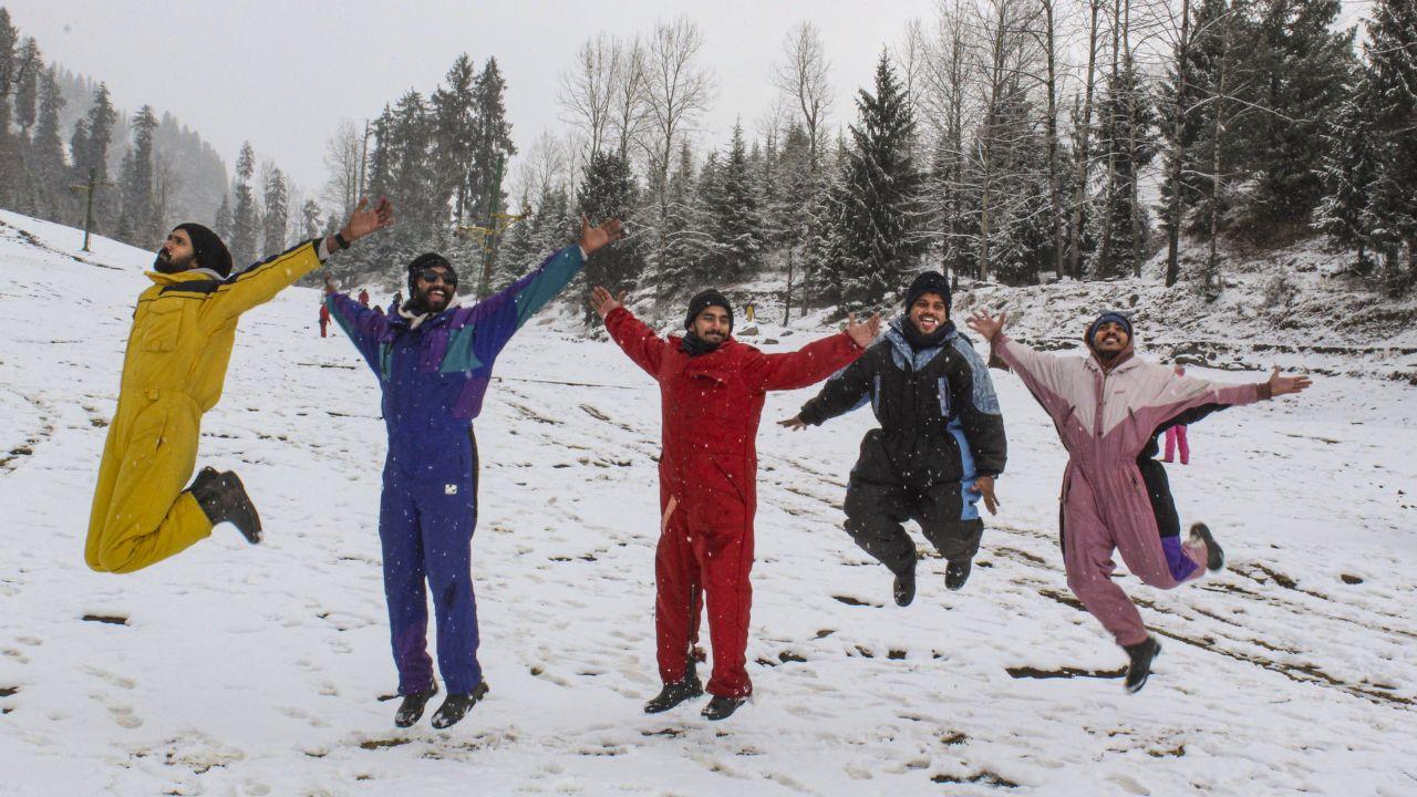 Snowfall was also recorded in key tourist destinations such as Manali, Kasauli, and Chail. (In Pic: Tourists pose in the snow after fresh snowfall in Solang Valley, in Manali, Himachal Pradesh)