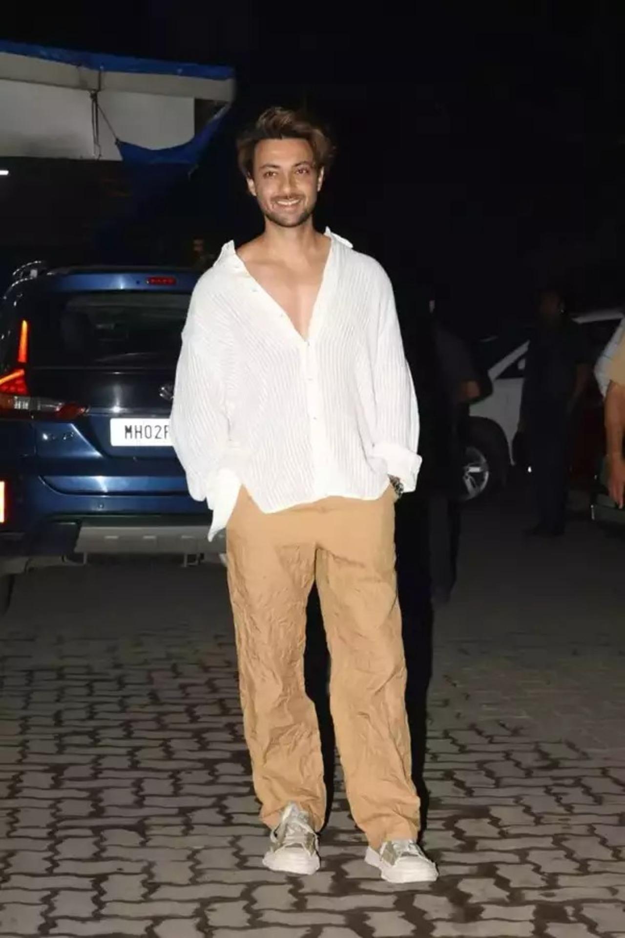 Aayush Sharma nailed the casual night look with this white oversized shirt and khakhee pants