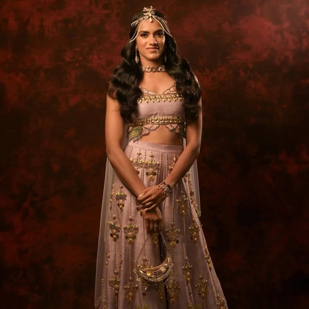 In one of her looks, she wore a stunning peach-colored lehenga set that made her look like a desi Barbie