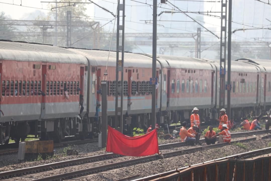 In Photos: Workers carry out maintenance work on Western Railway line