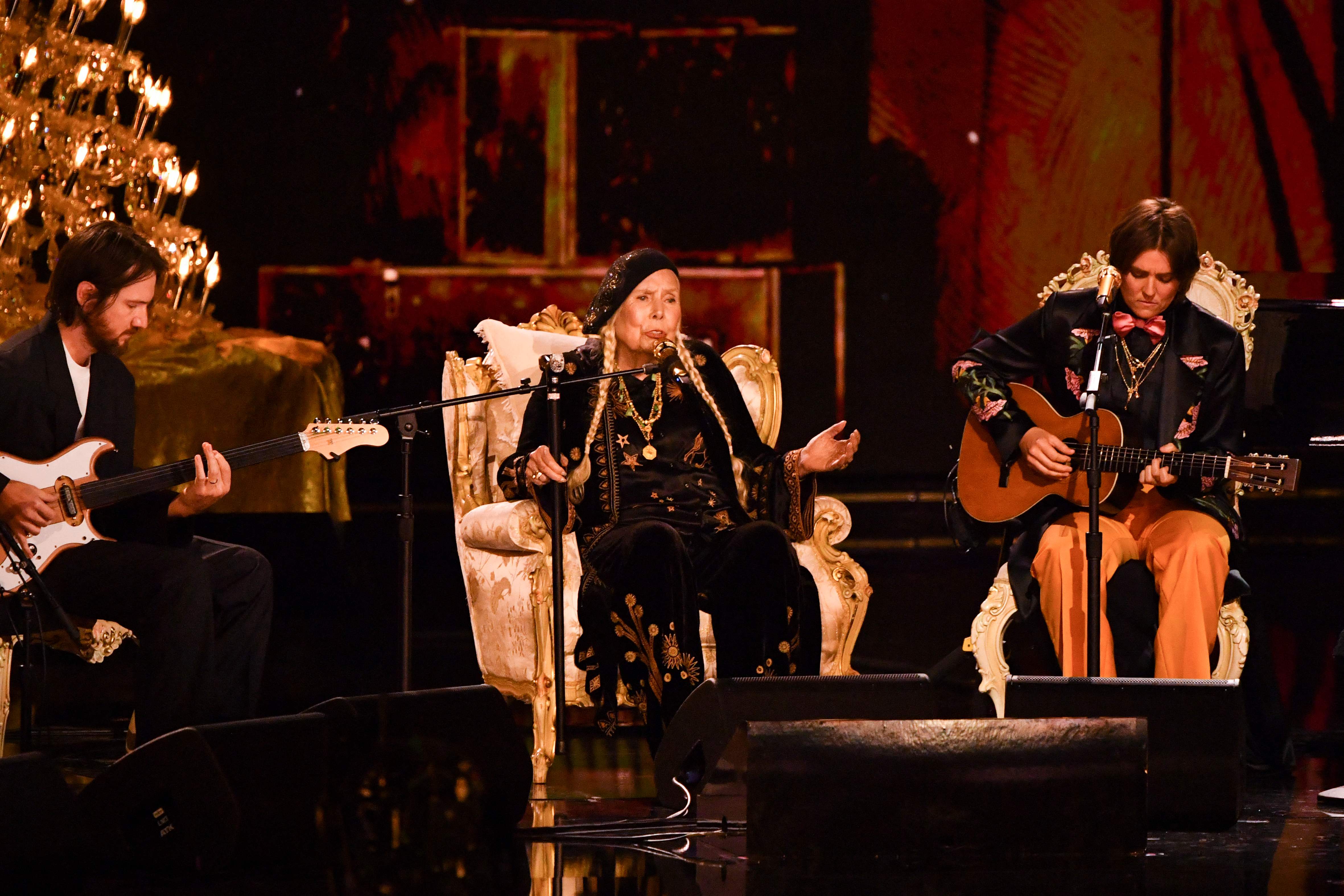 Canadian-US singer-songwriter Joni Mitchell performs on stage during the 66th Annual Grammy Awards 