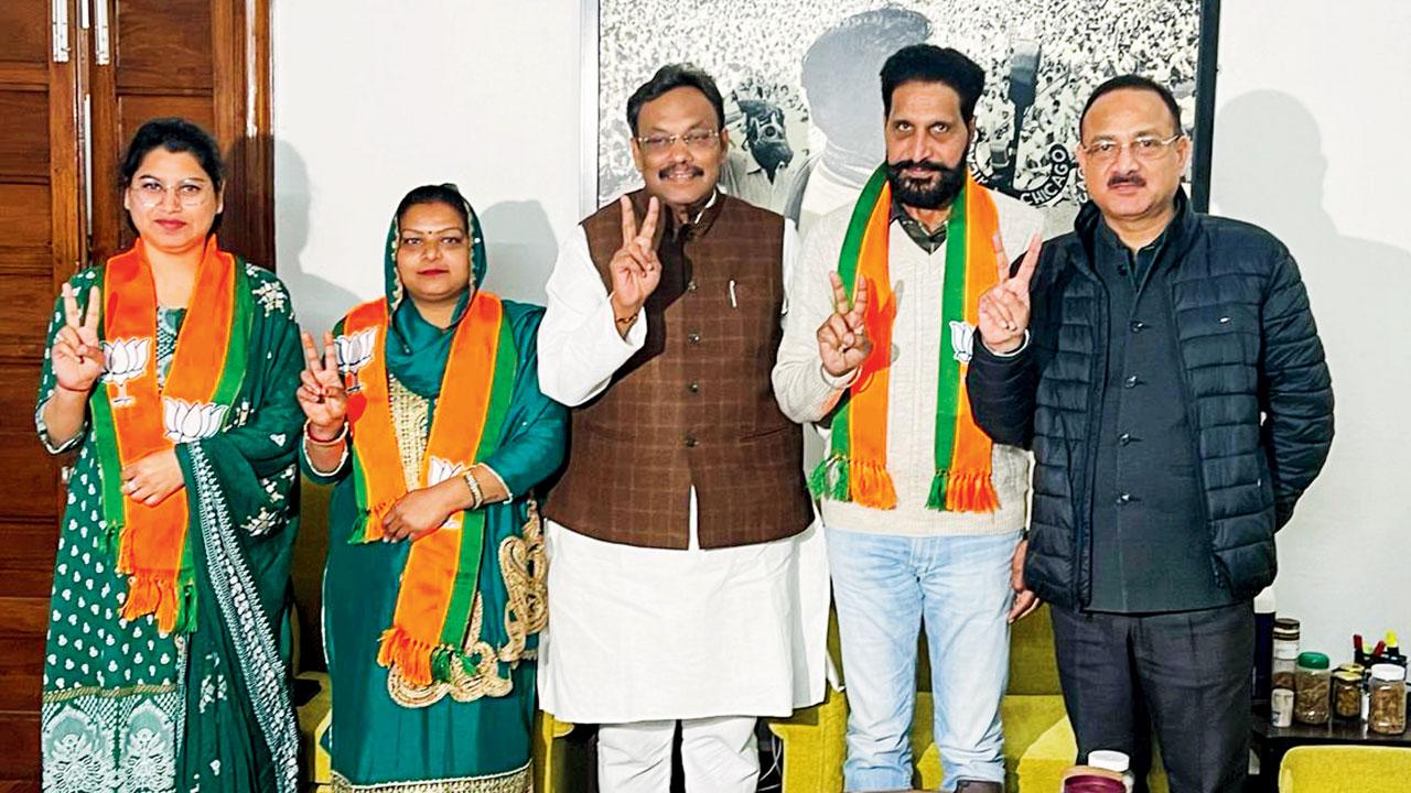 Aam Aadmi Party councillors from Chandigarh, Poonam Devi, Neha and Gurcharan Kala, join BJP. Pic/PTI