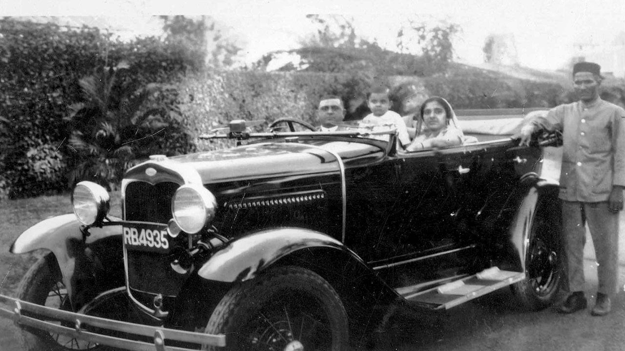Young Nariman (middle) with his parents Sam and Banoo Nariman, in the most modern car of the times (1932)