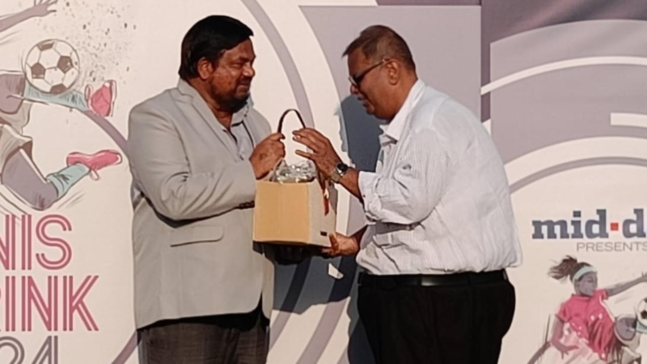 Mid-Day's sports head Mr. Clayton Murzello felicitated the president of MSSA Fr. Jude Rodrigues