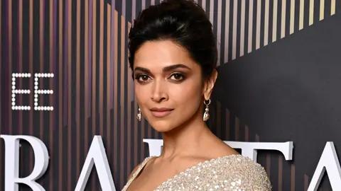 Bollywood superstar Deepika Padukone, who turned presenter for the 77th British Academy Film Awards, unveiled the winner under the Film Not In The English Language category. The actress, who looked bespoke in a shimmery Sabyasachi saree, turned heads as she walked on stage with the envelope to reveal the winner. Read More