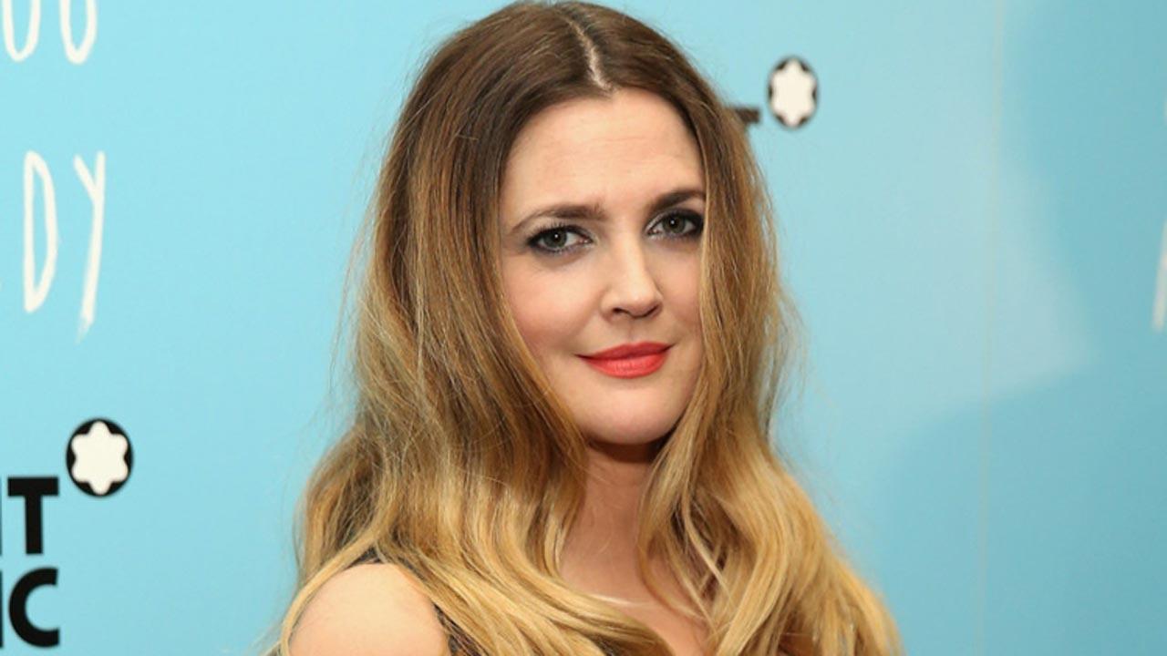 Drew Barrymore has no intentions of embracing her grays yet