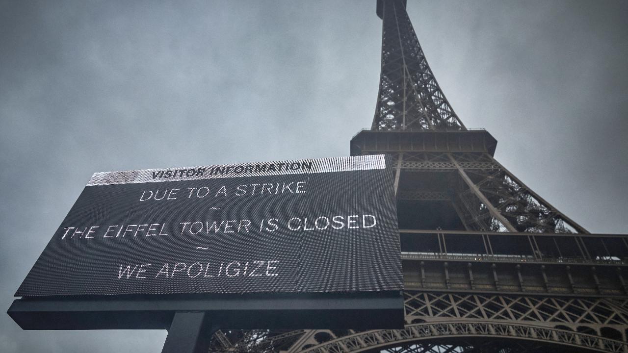 A board informing visitors that the Eiffel Tower, viewed in the background, is closed as staff go on strike, over the financial management of the monument by the city. Photos Courtesy: AFP/Pixabay