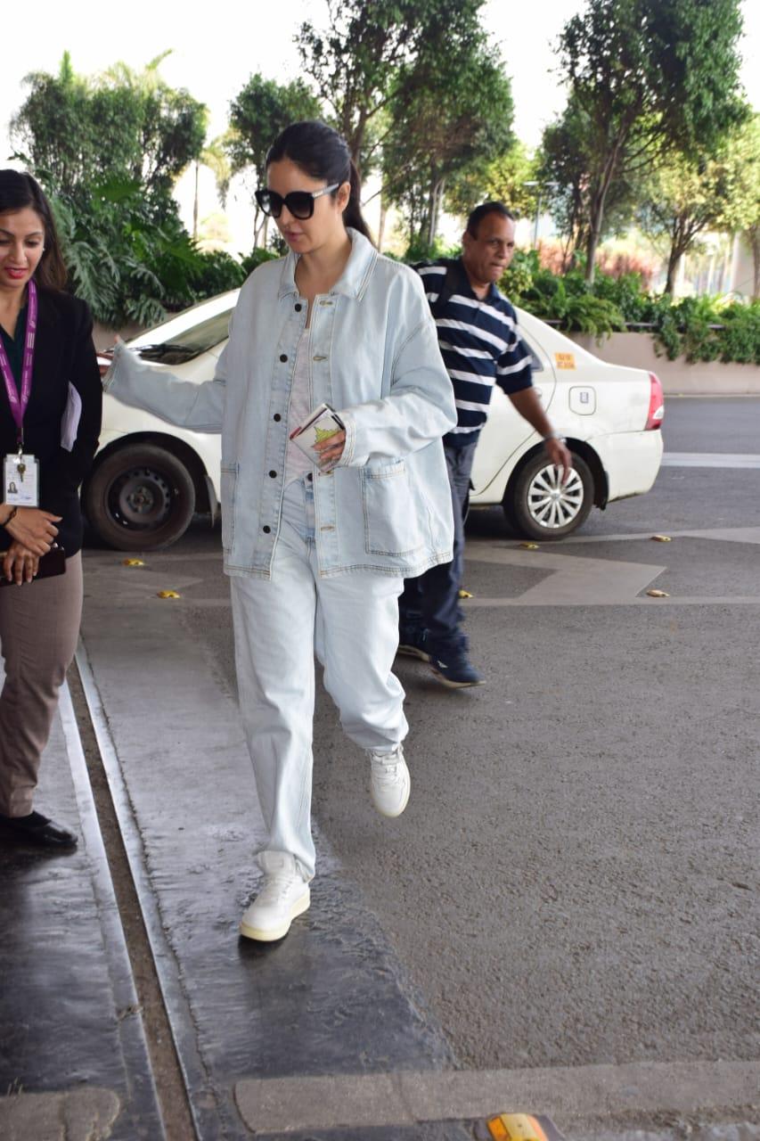 Katrina Kaif aced her airport look as she wore stylish pants and paired it with white T-shirt and denim jeans