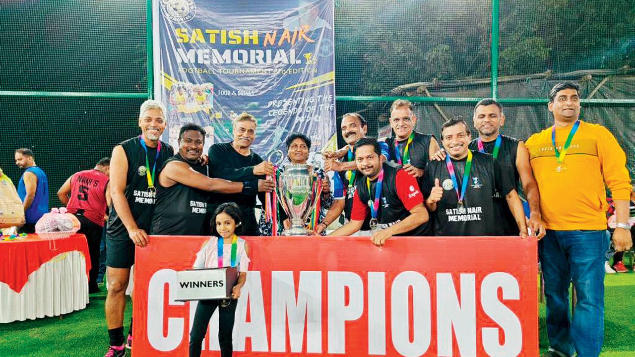 The victorious Ferraos with the Satish Nair Memorial rink football trophy