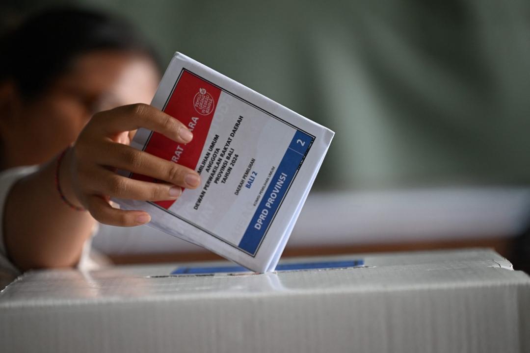In Photos: Voting begins in Indonesia to elect new President