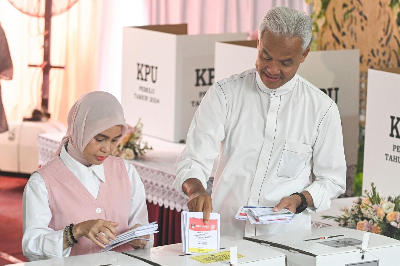 Polls opened at 7 a.m. in each of the three time zones across the tropical nation's 17,000 islands inhabited by 270 million people. The logistics of the vote were daunting: Ballot boxes and ballots were transported by boats, motorcycles, horses and on foot in some of the more far-flung locations