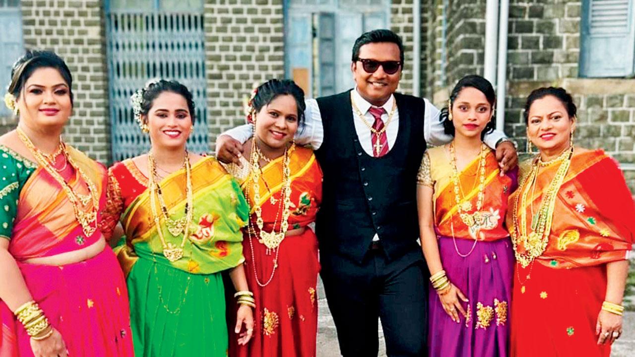 Members in traditional EI attire 