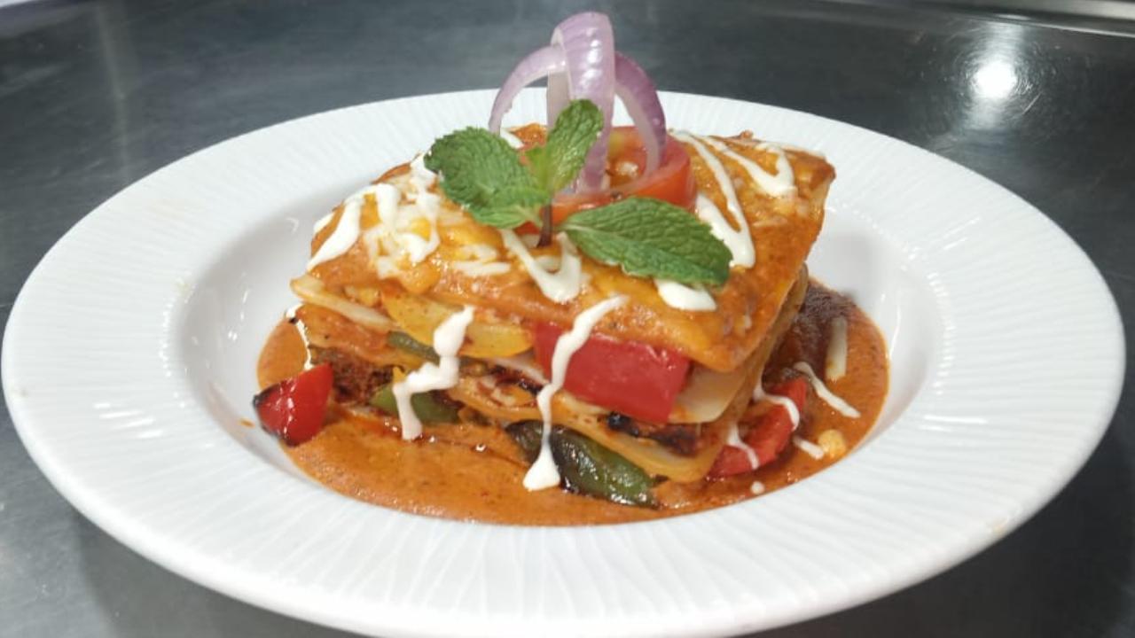 Tandoori Sabzi Lasagna with Creamy Makhani and Mint Chutney DrizzlePurists can move over classic pasta because Gen Z loves to innovate with their food and Suresh Babu N, executive chef at Clarks Exotica Convention Resort and Spa, says you can definitely do more. Babu wants you combine your love for Indian and Italian food to make Tandoori Sabzi Lasagna with Creamy Makhani and Mint Chutney Drizzle. 