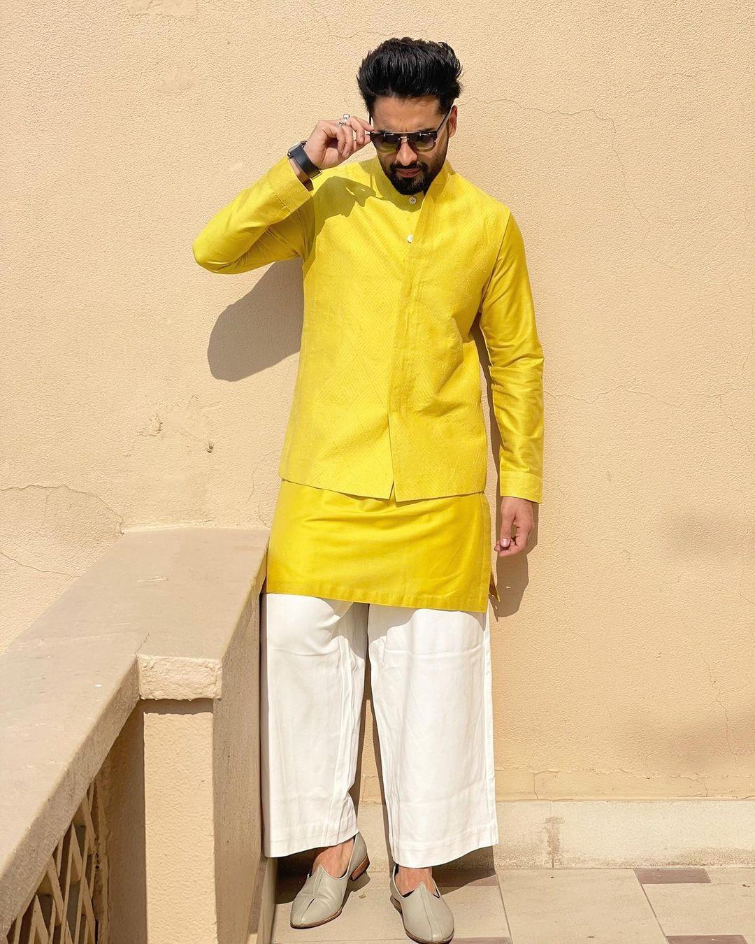 This vibrant ensemble, perfect for a friend's haldi ceremony, showcases Jackky's ability to stand out in the crowd with his sartorial choices.