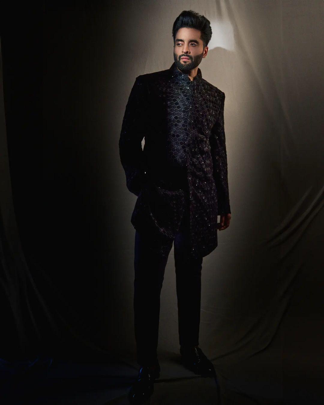 For a friend's reception party, Jackky chose an all-black outfit, including a classic sherwani. Paired with stylish shiny black shoes, this look is sophisticated and on point