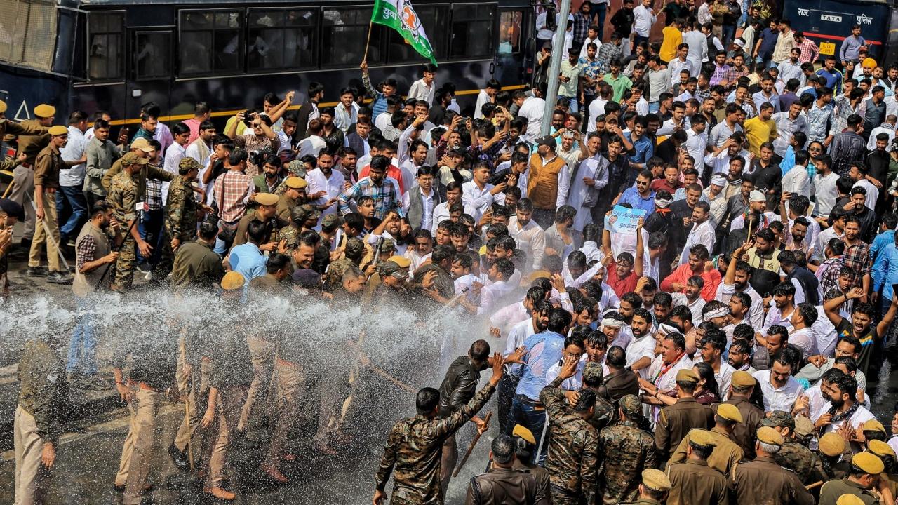 The protestors were stopped near the Police Commissionerate. When they did not pay heed to the warning, the police resorted to cane charging and used water cannons to disperse the crowd