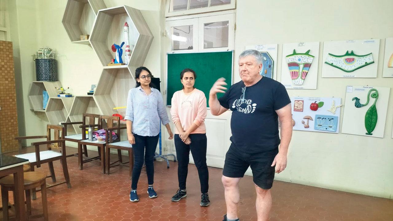 Dr Stuart Kohlhagen (in black T-shirt) interacts with educators at the Victoria Memorial School for the Blind in Tardeo