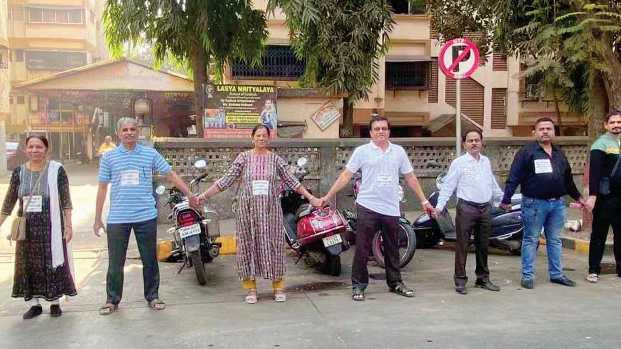 Residents forming a human chain to protest