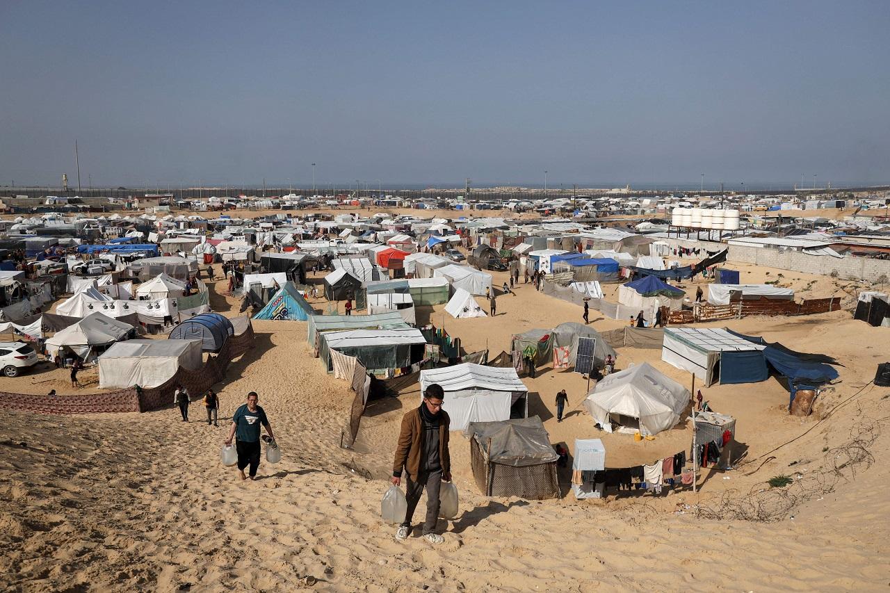 Israel's assault on Gaza, which it says aims at destroying Hamas after its attack, has killed more than 29,900 Palestinians. UN officials warn of further mass casualties if it follows through on vows to attack the southernmost city of Rafah, where more than half of Gaza's population of 2.3 million has taken refuge. They also say a Rafah offensive could collapse the aid operation that has already been crippled in the fighting