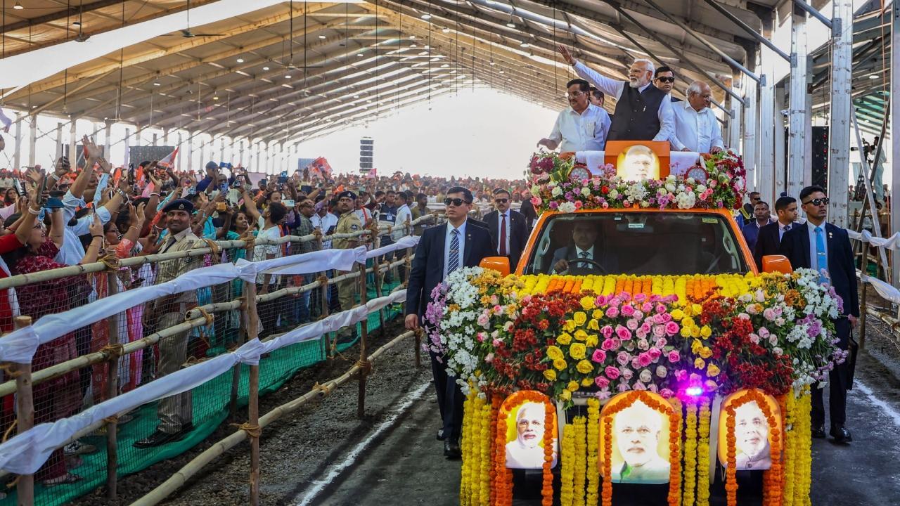 IN PHOTOS: PM Modi holds mega roadshow in Gujarat's Navsari