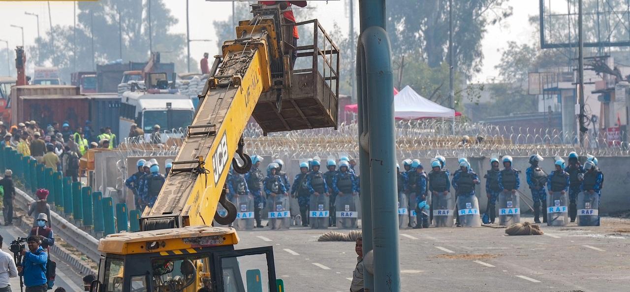 At Tikri and Singhu borders, the Delhi Police has put in place multiple layers of barricades, barbed wires and concrete blocks to stop farmers from entering the capital