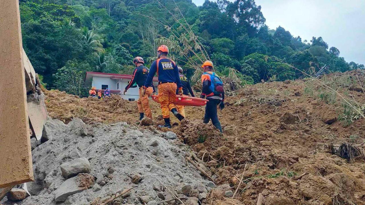 Landslide strikes buses and homes in southern Philippines, leaving 27 miners missing