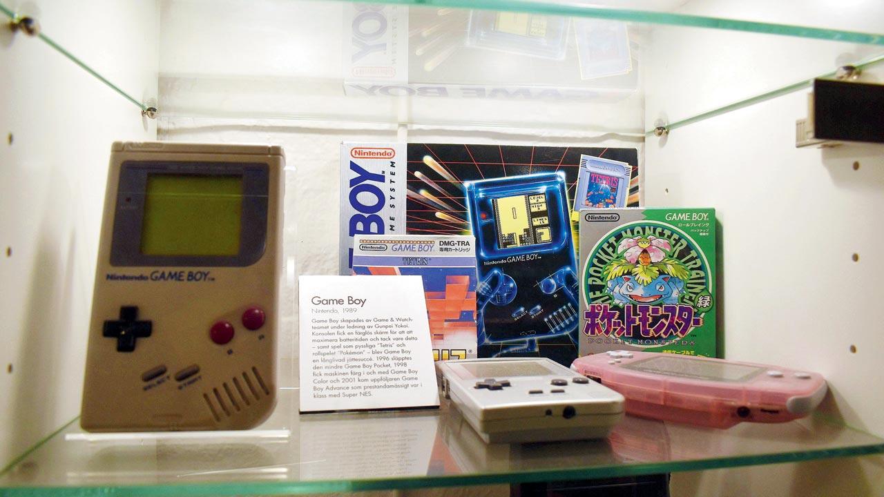 The first Game Boy console and Pokémon cartridges. Pic Courtesy/Wikimedia Commons