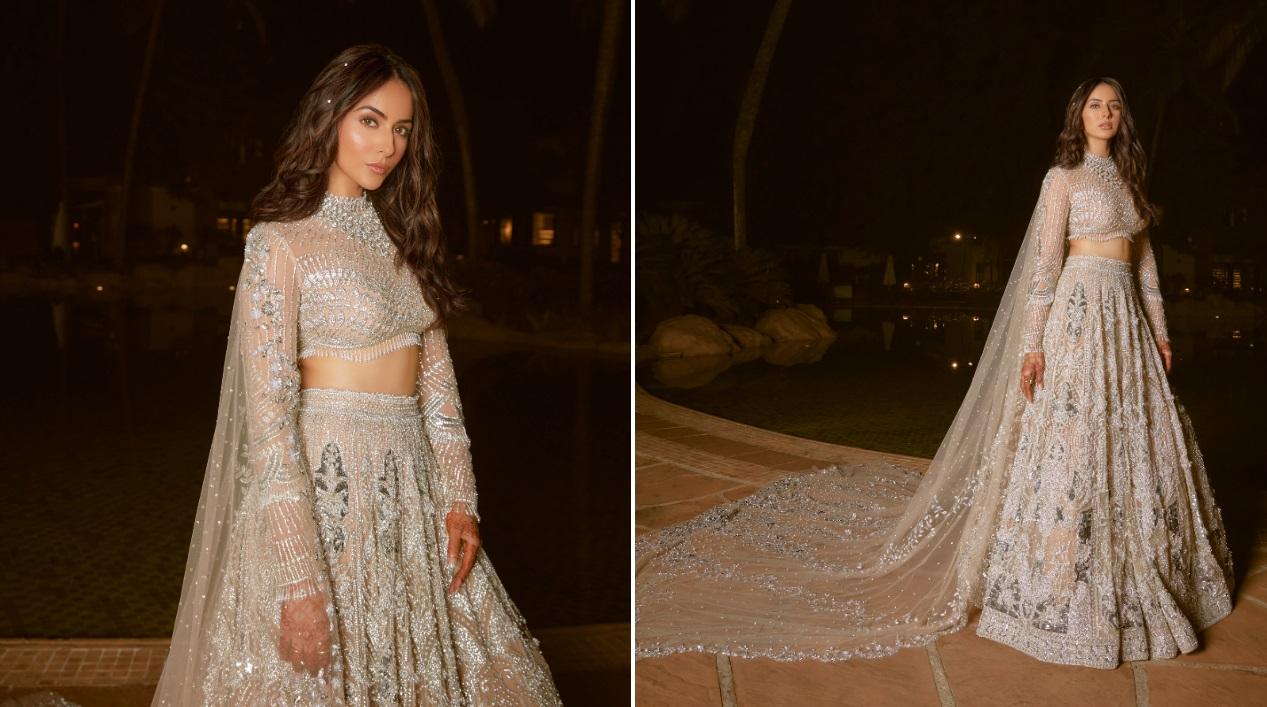 Rakul dazzled in a stunning off-white and silver lehenga, replete with intricate light gold embroidery on a beige base.