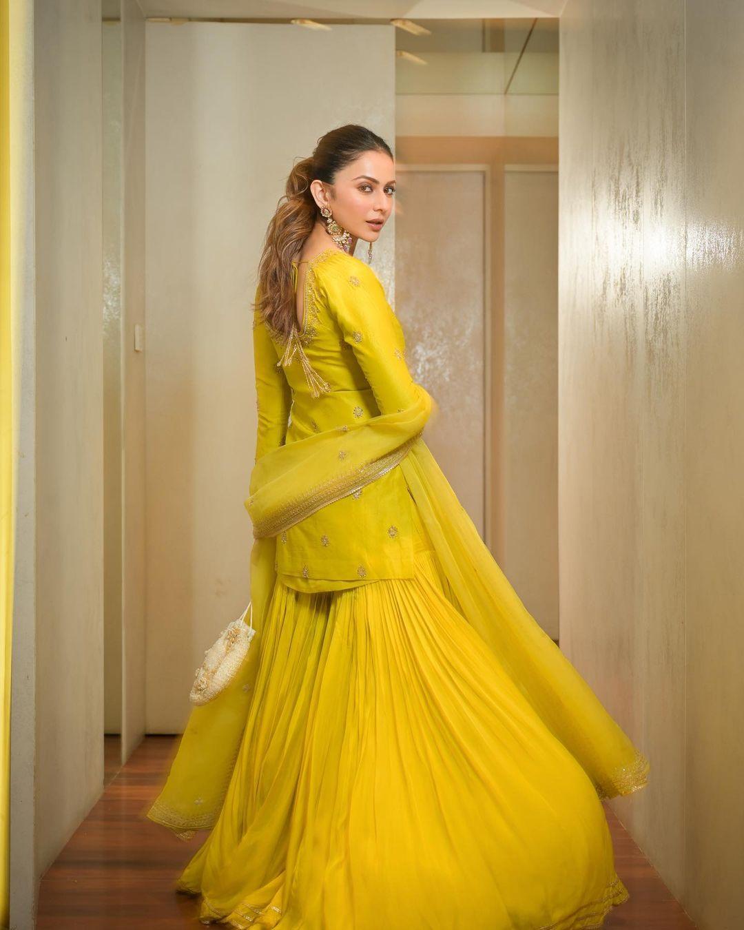 The beautiful sharara is paired with a matching kurta featuring intricate embroidery