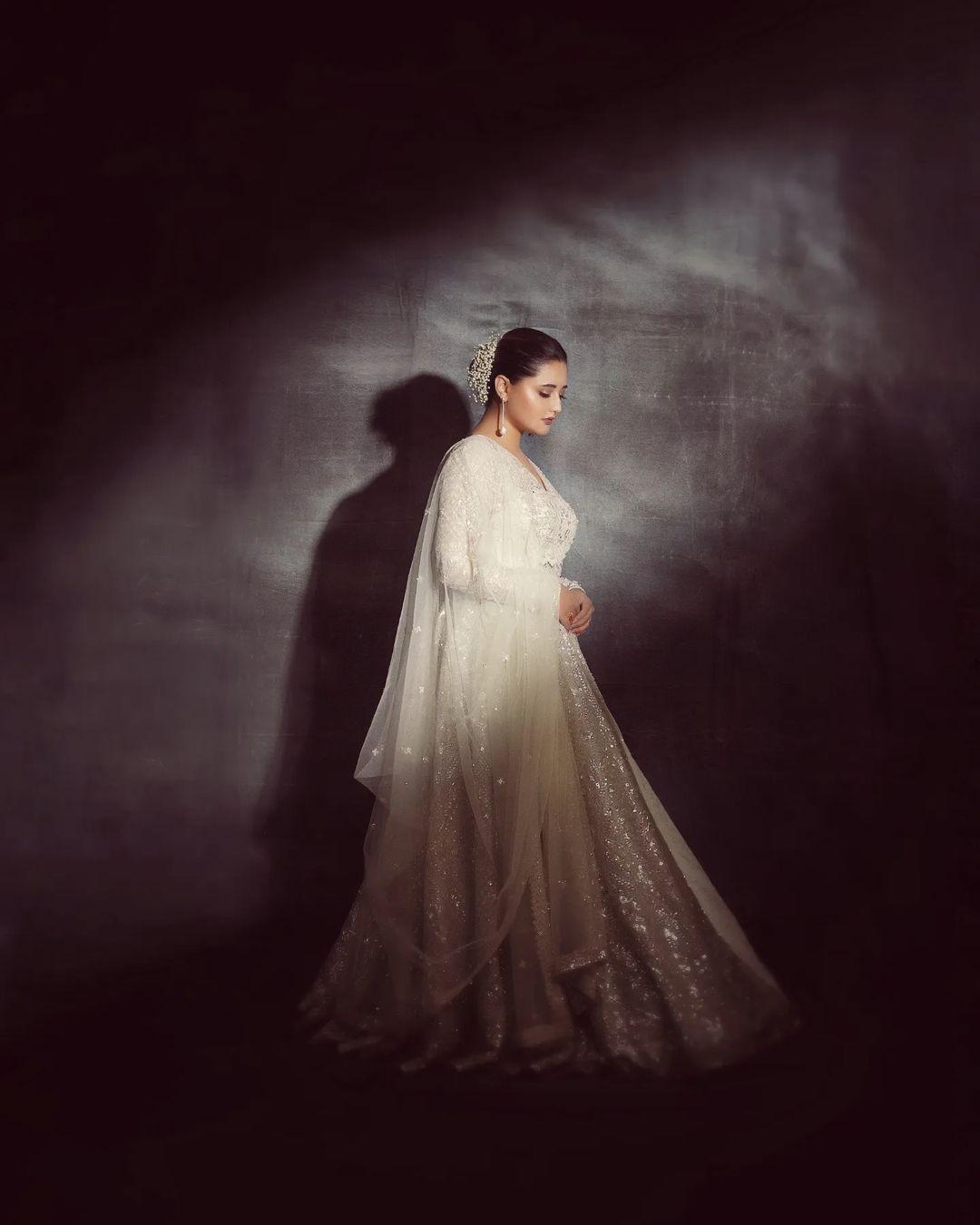  The chic bun, adorned with a beautiful gajra, elevates the actress' overall look