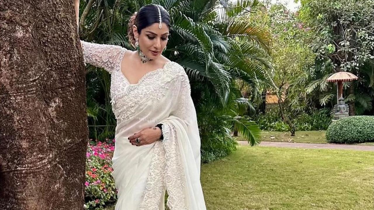 Raveena Tandon exudes elegance in white saree, which she donned for a weeding, see pics!