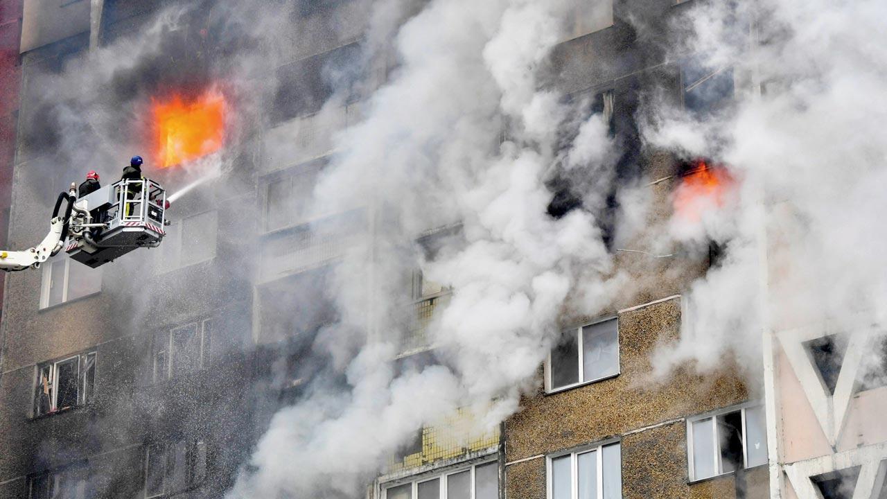 Russian strike on Kyiv kills three, injures 13