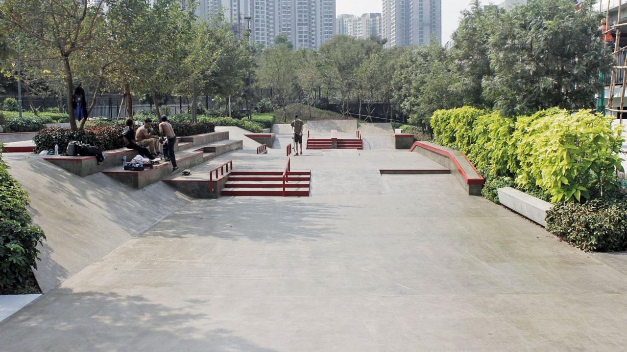 Skaters test the course at the newly opened skate park
