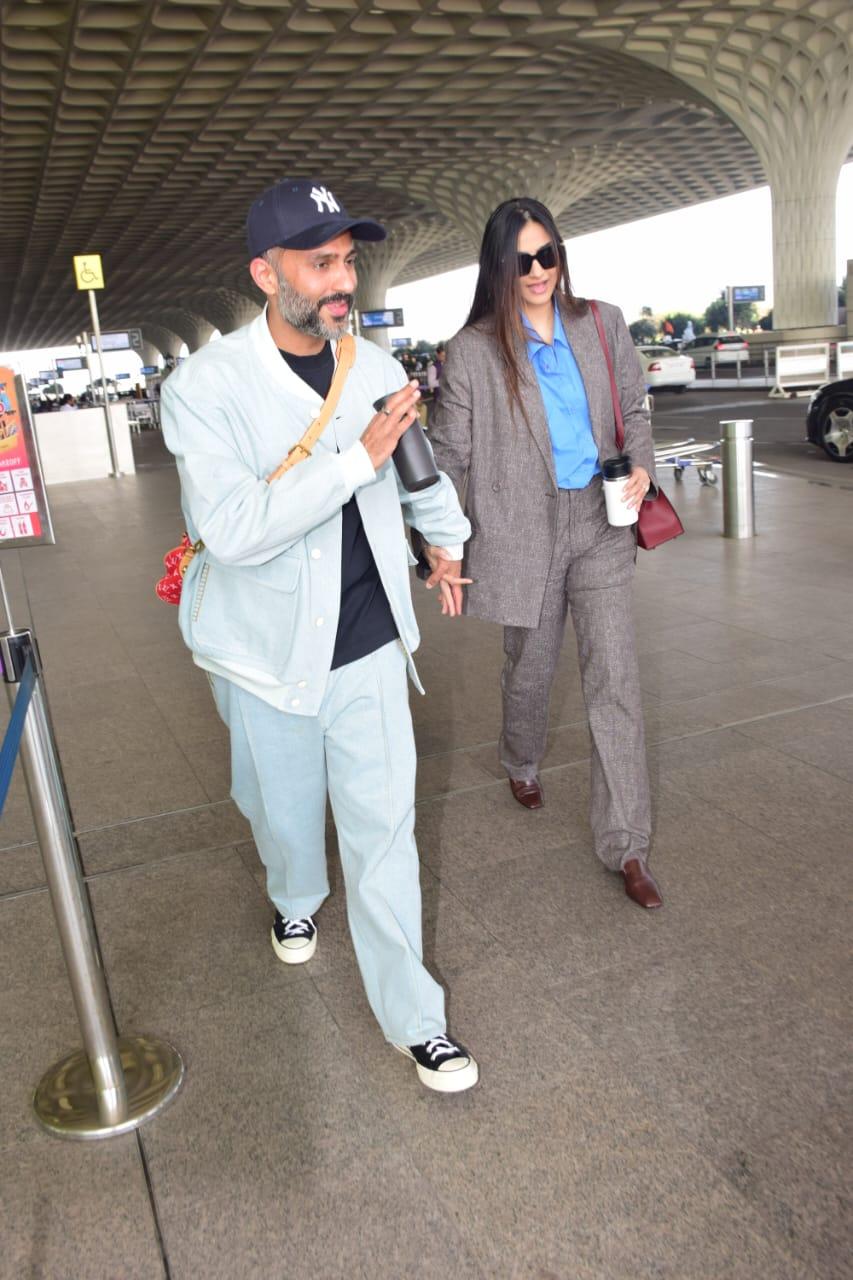 Sonam Kapoor was snapped at the airport with her husband Anand Ahuja as they jetted off from the city
