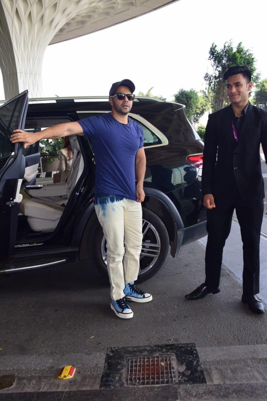 For his comfy look, Varun opted for a blue T-shirt and paired it with white pants