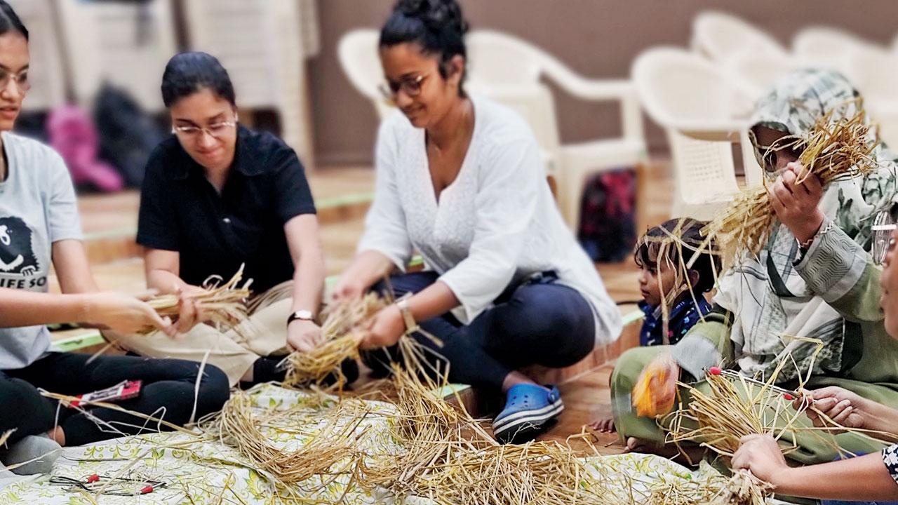 Participants stack straws for growing mushrooms. Pics Courtesy/Naturalistexplorers