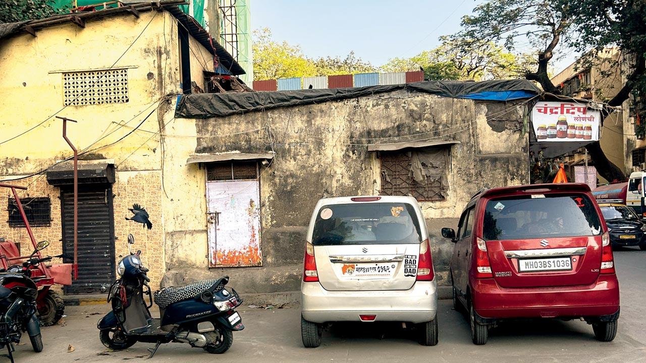 Perpendicular parking of cars is illegal and takes up space for walking