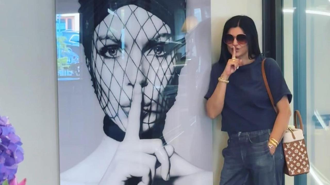 Sushmita strikes the finger-on-your-lips gesture, besides a billboard showing a model doing the same pose. The actress opted for a casual look by wearing a blue t-shirt, which she paired with blue denims and dark sunglasses
 