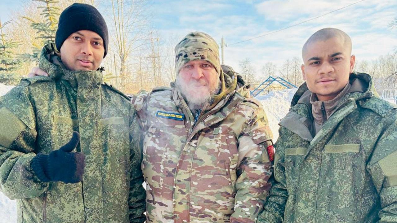 Tahir from Gujarat (right) Russian army officer (middle) and one Sarfaraz (left)