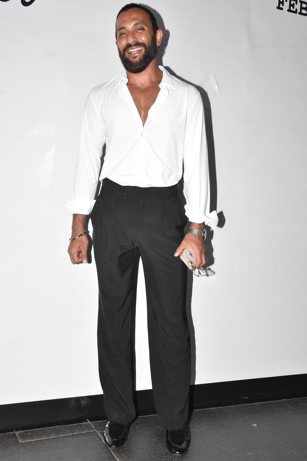 Choreographer Terence Lewis was all smiles as he attended the party wearing a crisp white shirt with black trousers