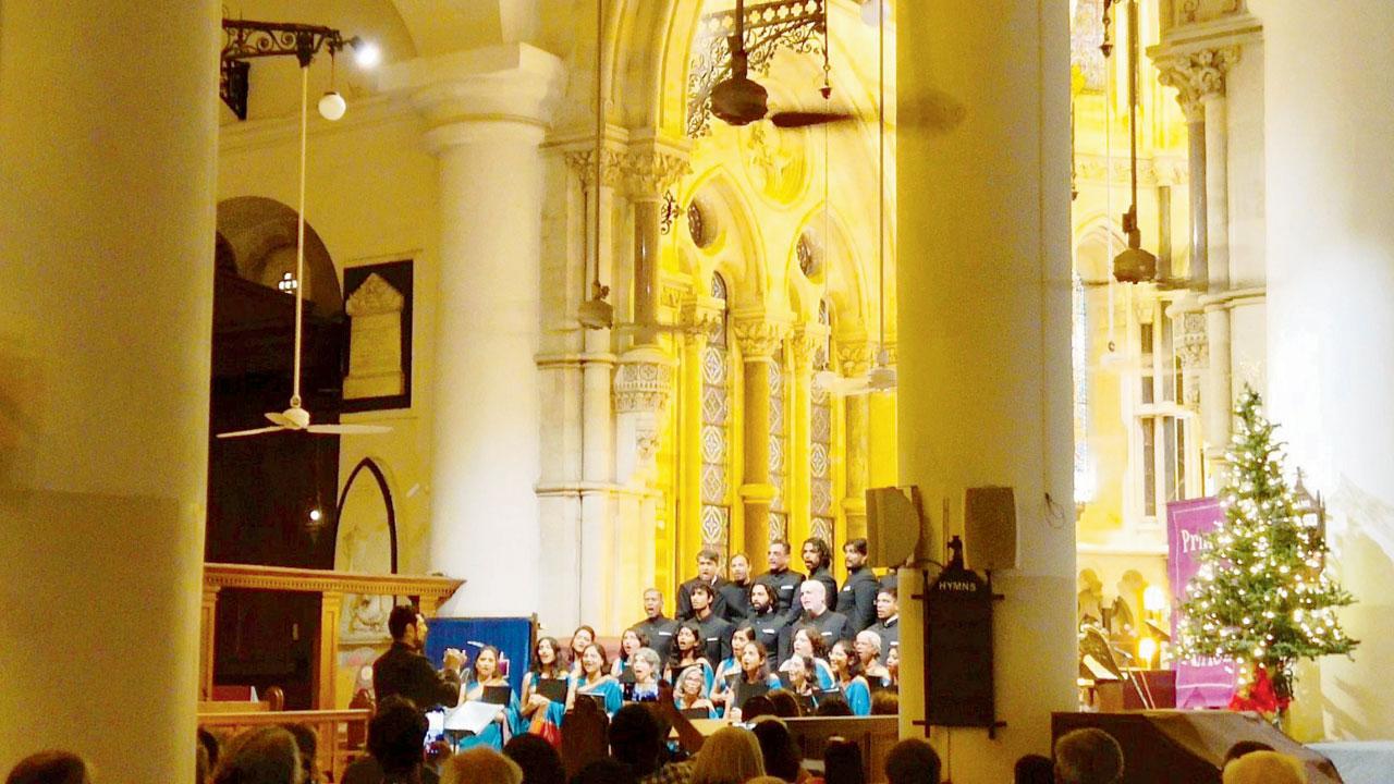 He conducts the choir on their Christmas 2023 concert in the presence of Coomi Wadia at St Thomas Cathedral in Fort