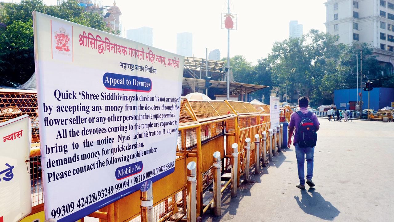 Advisory for devotees outside temple in October 2023. Pic/Anurag Ahire